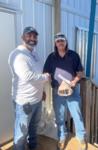 UXOSO Jose Gomez (left) is presented the Safety Star Award by Project Manager Bob Hannan (right)