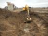 Excavation of soil for pipe inspection at the former SFAAP, KS.