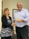 Robin Miller (left) is presented with the Safety Star Award by USAE President Wayne Lewallen (right)