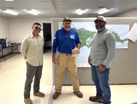 Luis Vazquez Sr. (middle) is presented with the Safety Star award by Jose Ramos (left) and Jose Gomez (right).